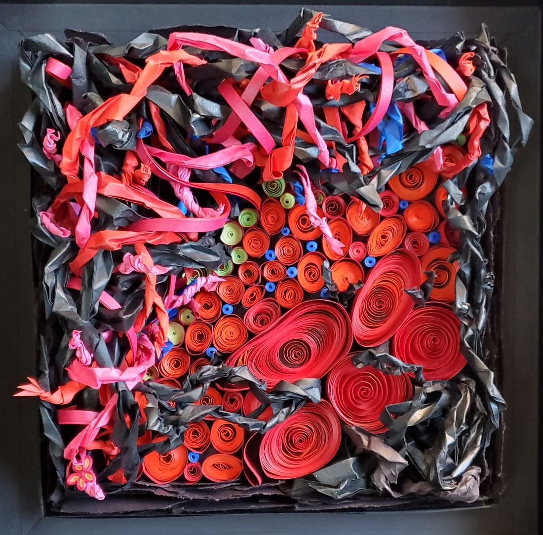 Choking on Crimson Anger: tangled red paper rosettes and ribbons over black paper strips