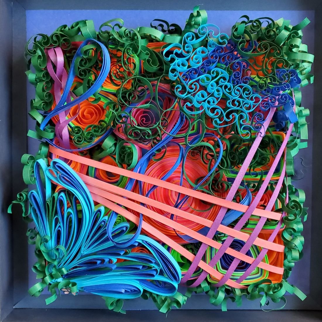 Neon Echoes of Mania: green curls, blue coils and pink diagonal strips crossing over red and purple paper